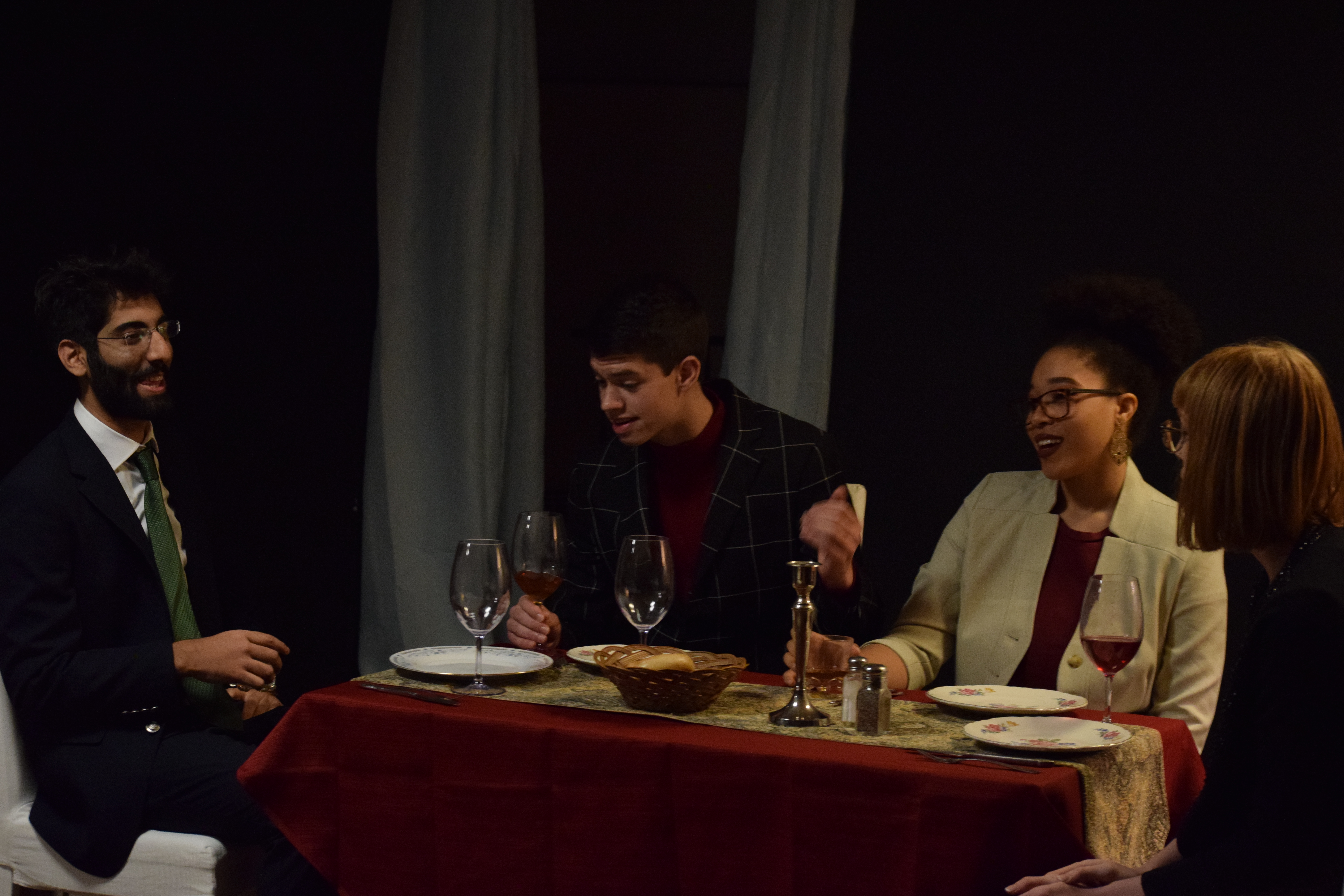 The dinner party scene: Arnaav Bhavanani, Abhishek Fakiraswaminath, Dache Rogers, Ava Biery